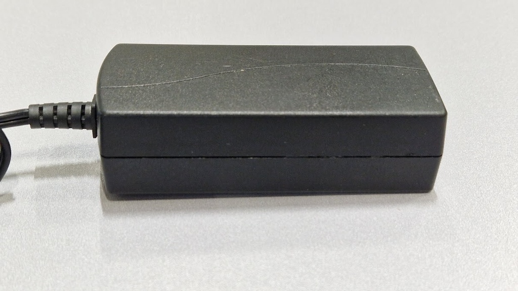 APD DA-42H24 AC Adapter 24V 1.75A Used Working Without Power Cord