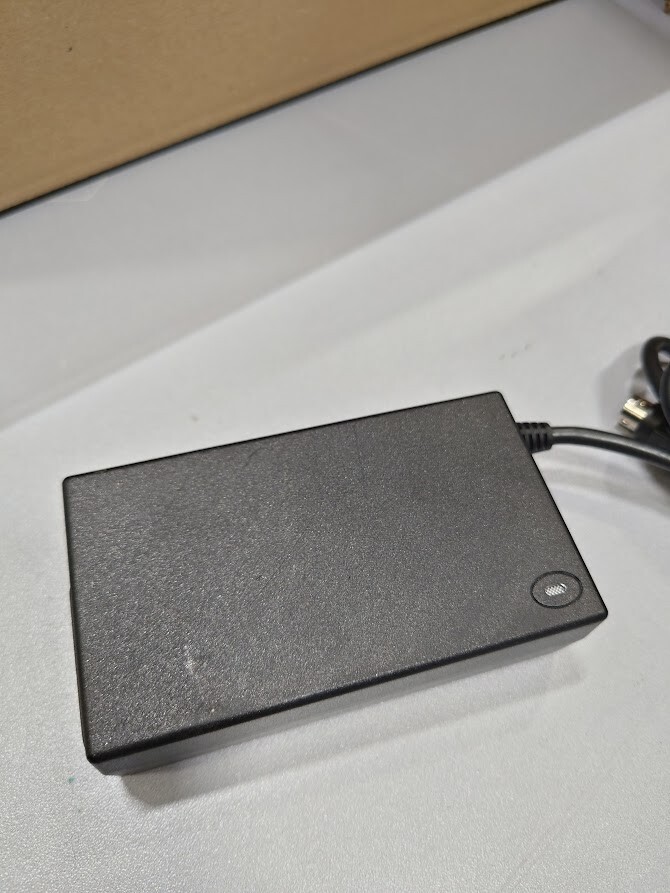 APD DA-50C24 AC Adapter 24V 2.15A Used Working Without Power Cord